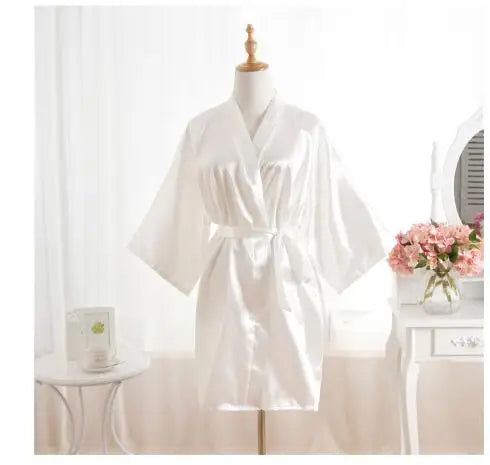 Hunkemöller satijnen ochtendjas kantdetails – Chic en romantisch