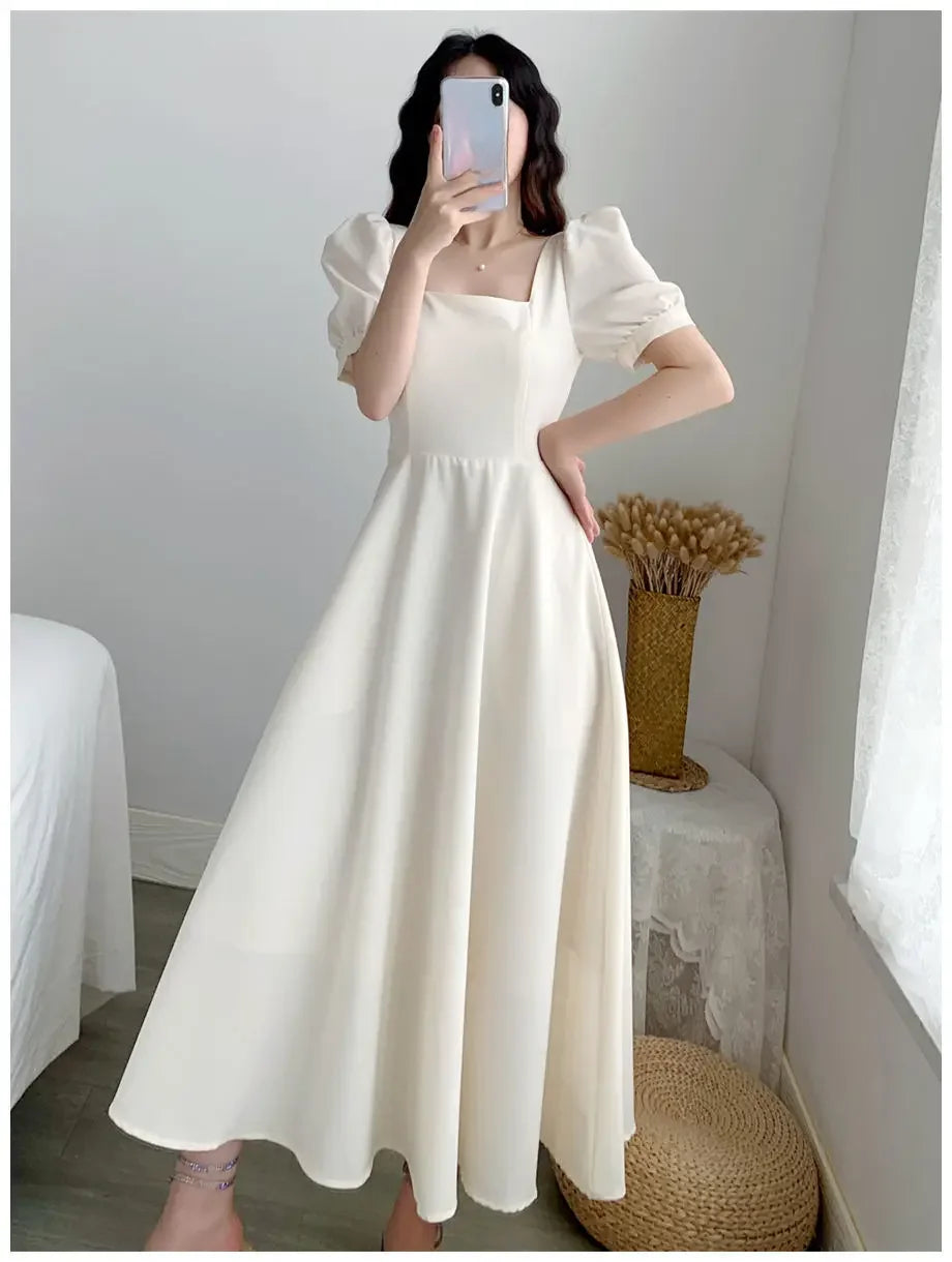 Elegante bruiloft gast jurk in pastelkleuren