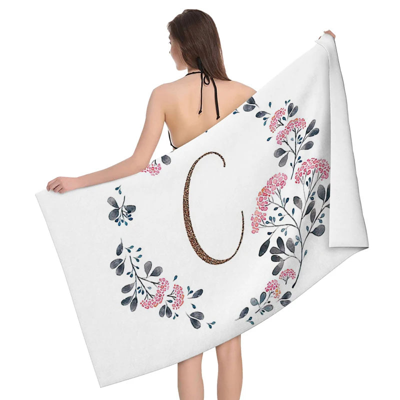 Badhanddoek met borduursel β Luxe uitstraling