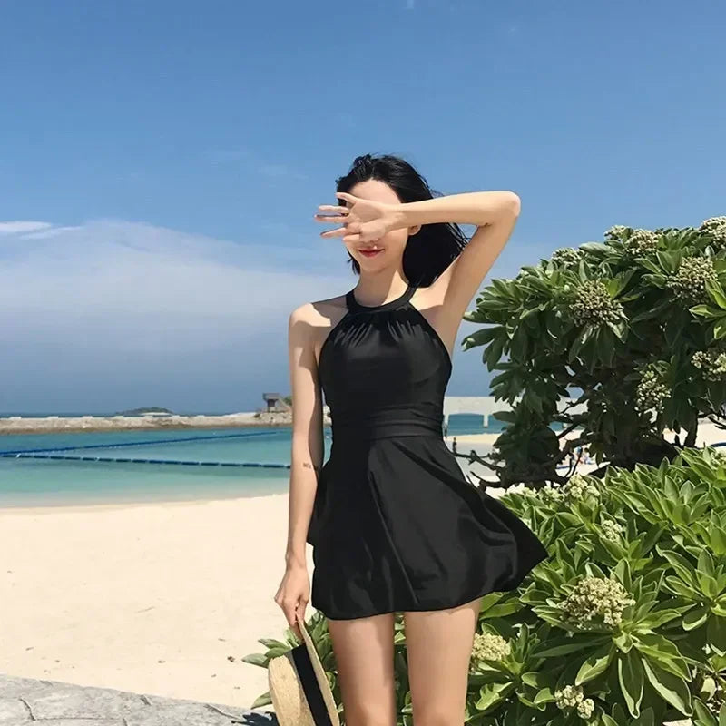 Zwemjurk met glanzende stof – Chic aan het strand