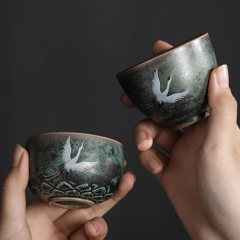 Porseleinen theepot met bijpassende kopjes
