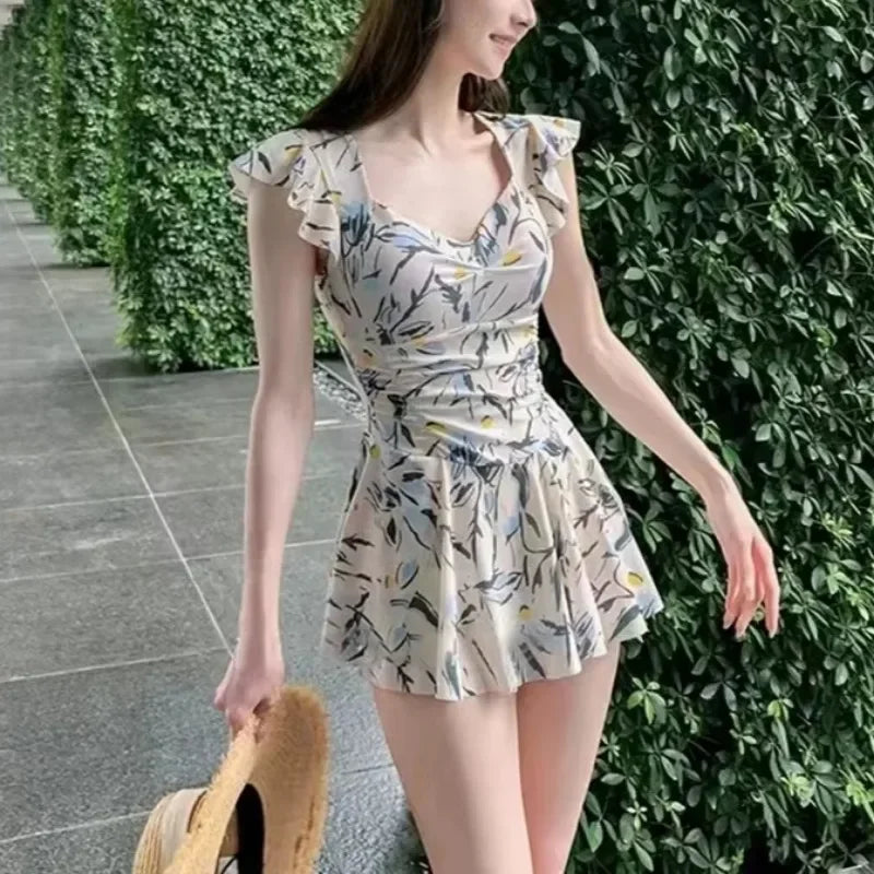 Zwemjurk met knoopdetail – Subtiel en charmant