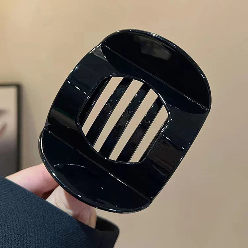 Grote scrunchie als modieus accessoire