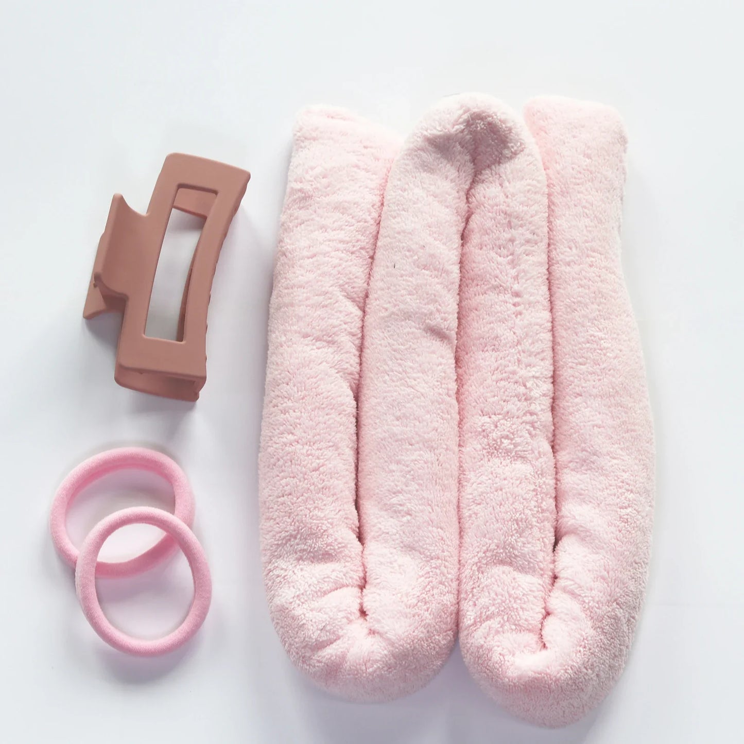 Haar accessoires met klassieke parelaccenten