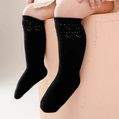 Schattige babykleertjes in pastelkleuren
