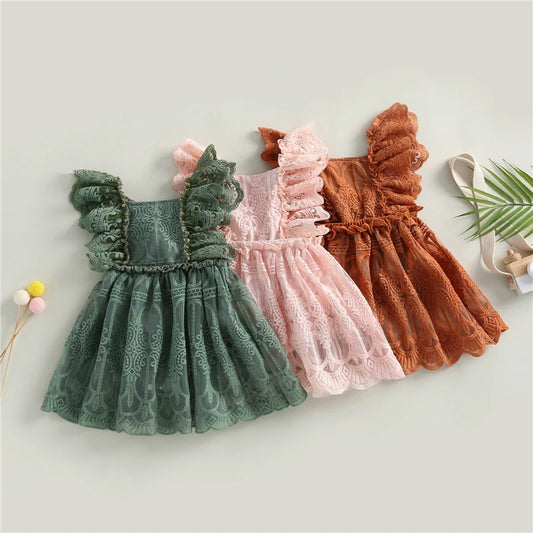 Meisjes kleding met glitters en strikken