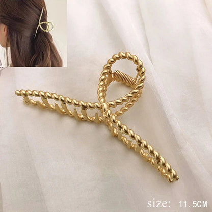 Decoratieve haarclip met bloemmotief