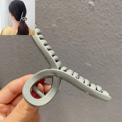 Gouden haarclip als stijlvolle accessoire