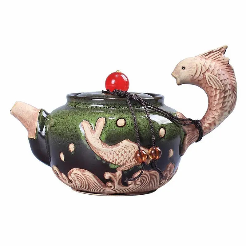Theepot met geïntegreerde filter en schenktuit