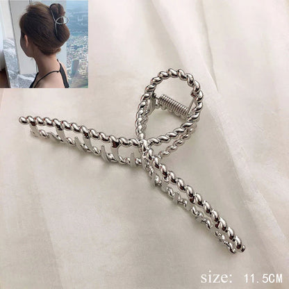 Gouden haarclip als stijlvolle accessoire
