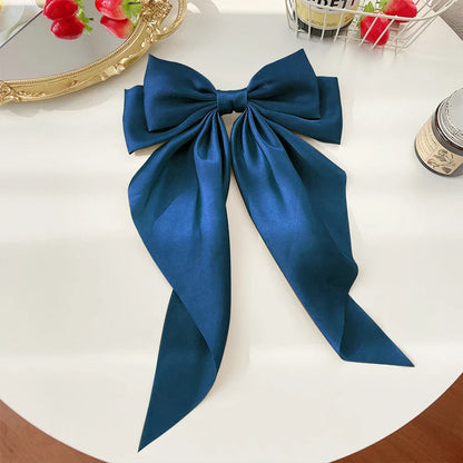 Fluwelen haar accessoires in warme kleuren