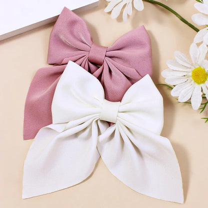 Fluwelen haar accessoires in warme kleuren