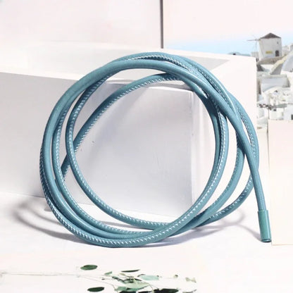 Riem in beige tint met houten gesp