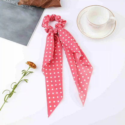 Fluwelen haar accessoires in warme kleuren
