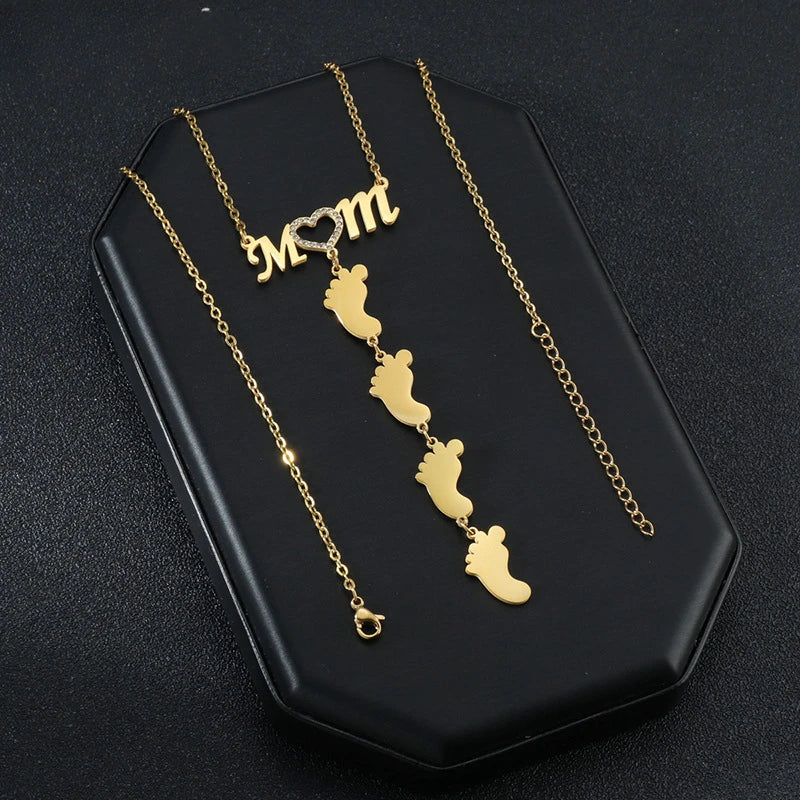 Ketting met naamplaatje en hartvormig detail