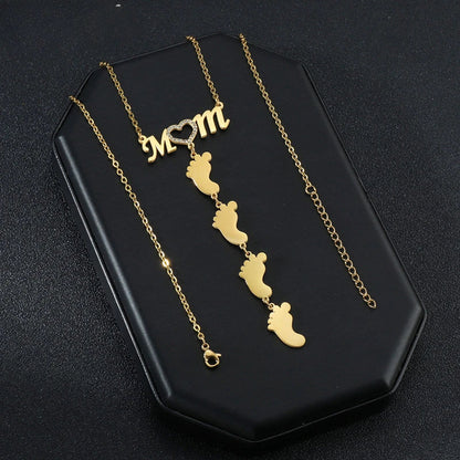 Ketting met naamplaatje en hartvormig detail