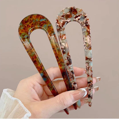 Gouden haarclip als stijlvolle accessoire
