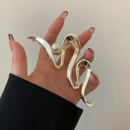 Haarband met metalen details en zachte pasvorm