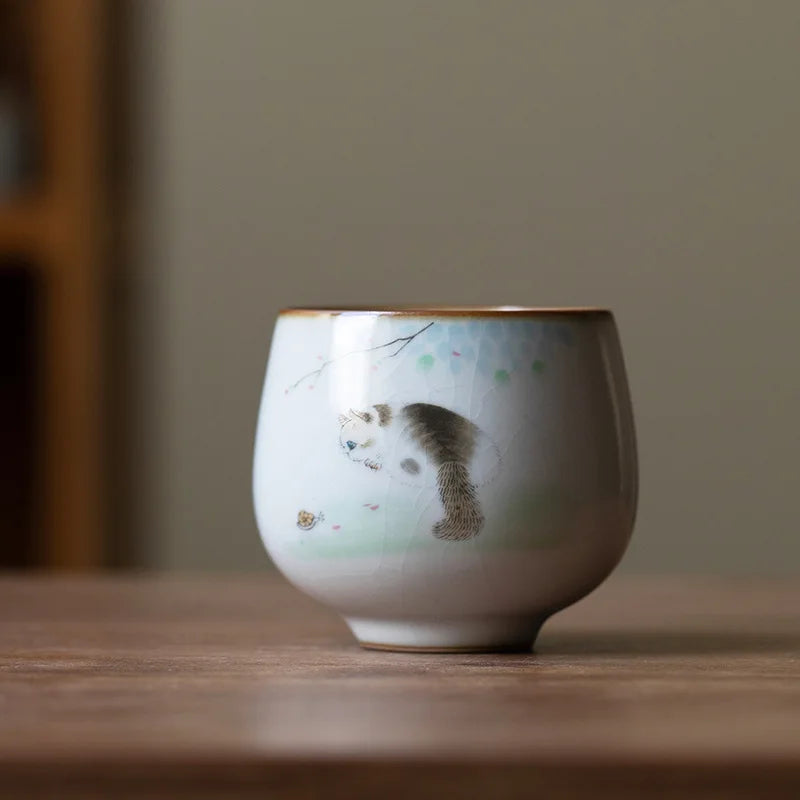 Thee zetten met gietijzeren theepot en accessoires