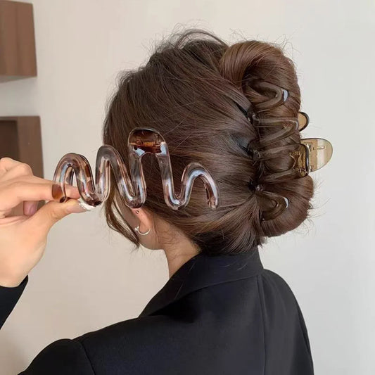 Fluwelen haar accessoires in warme kleuren