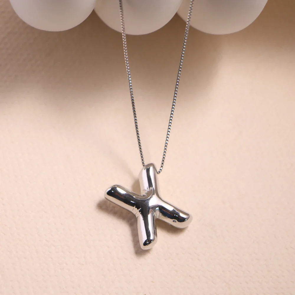 Naam in ketting als symbool van verbondenheid