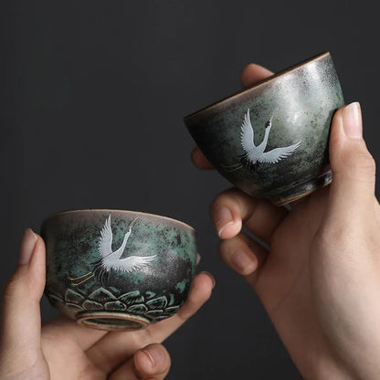 Porseleinen theepot met bijpassende kopjes