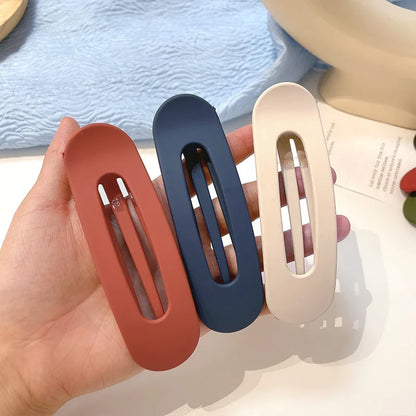 Set haarclips met moderne print