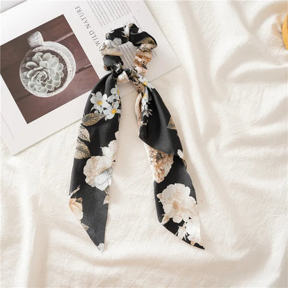 Set haaraccessoires met scrunchies en clips