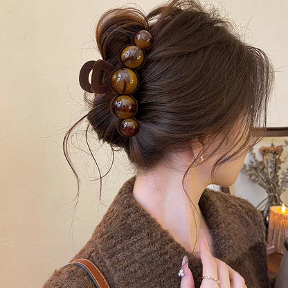 Haar accessoires dames met gouden accenten