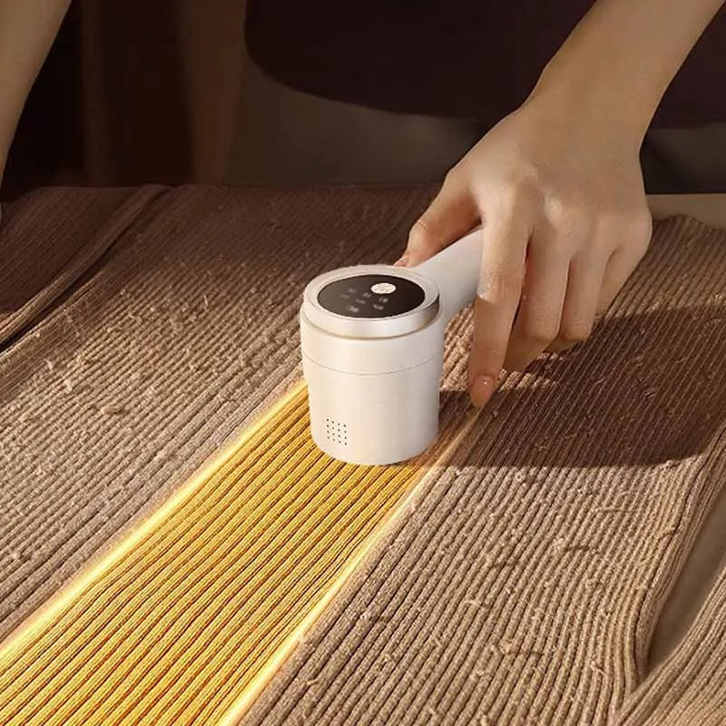 Pluizentondeuse voor tapijten en bekleding