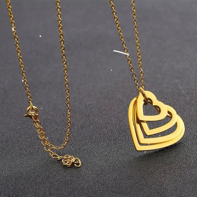 Ketting met naamplaatje en hartvormig detail