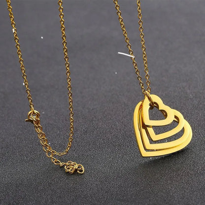 Ketting met naamplaatje en hartvormig detail