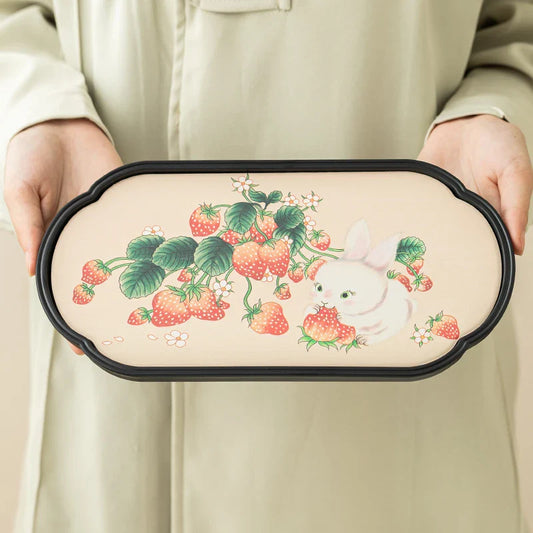 Thee zetten met gietijzeren theepot en accessoires
