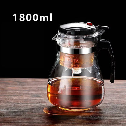 Theepot met houten handvat en infuser