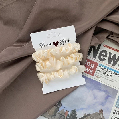 Set haar accessoires met pastel scrunchies