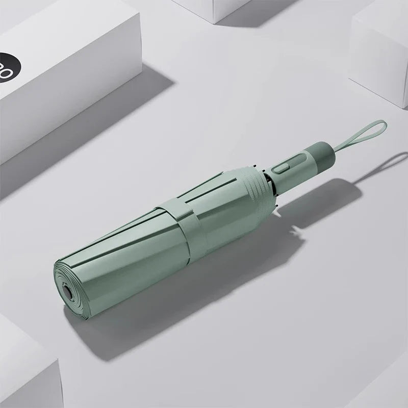 Draagbare paraplu met compacte vorm