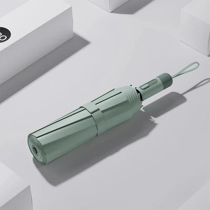 Draagbare paraplu met compacte vorm