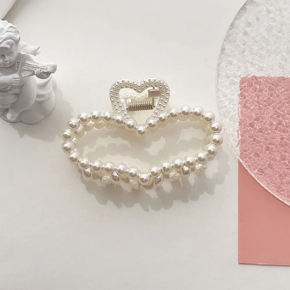 Minimalistische haar accessoires in goudkleur