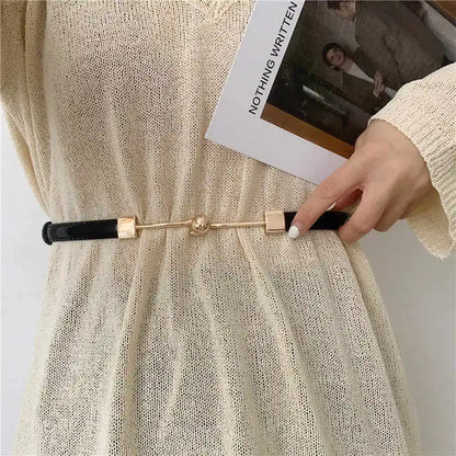 Riem met metalen kettingdetail als modeaccent