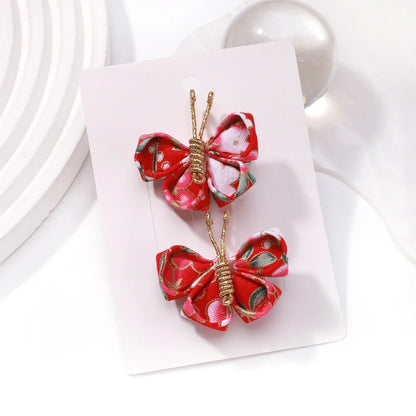 Set haarclips met moderne print