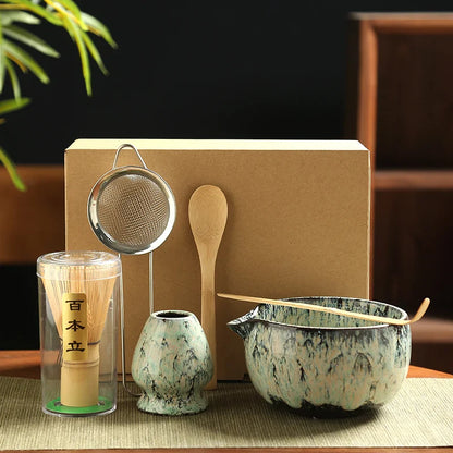 Thee accessoires van glas, hout en metaal