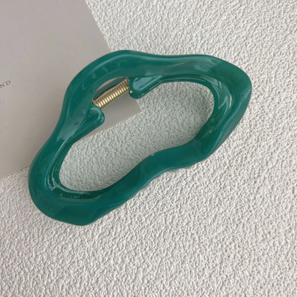 Stijlvolle scrunchies van satijn en fluweel