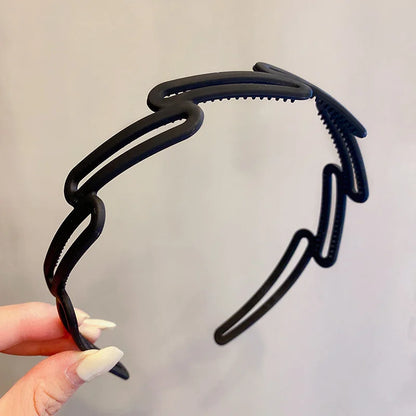 Haarband met metalen details en zachte pasvorm