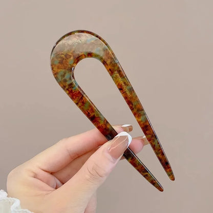 Ronde haarklem met gladde textuur
