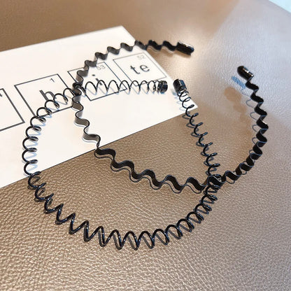 Moderne haarband met knoopdetail