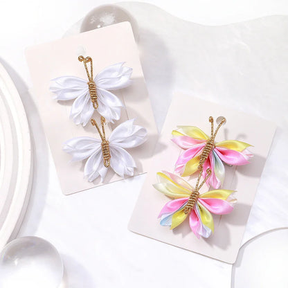 Set haarclips met moderne print