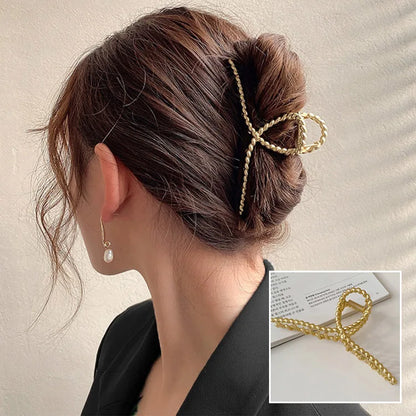 Gouden haarclip als stijlvolle accessoire