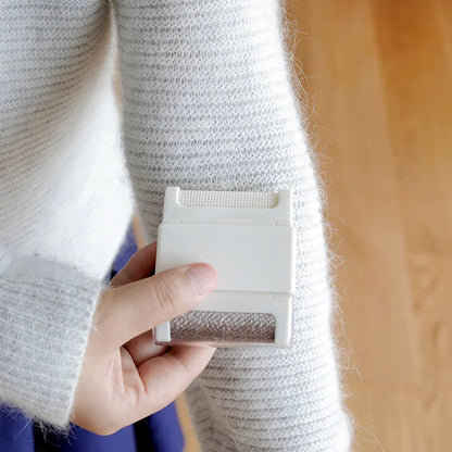 Draagbare kledingpluizentondeuse met veiligheidskap