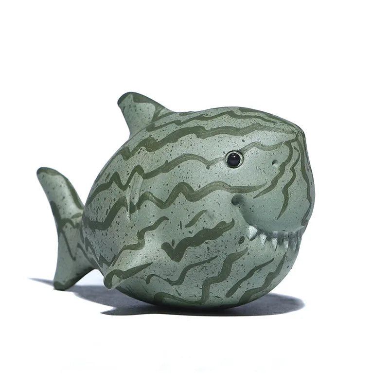 Theepot met houten handvat en infuser