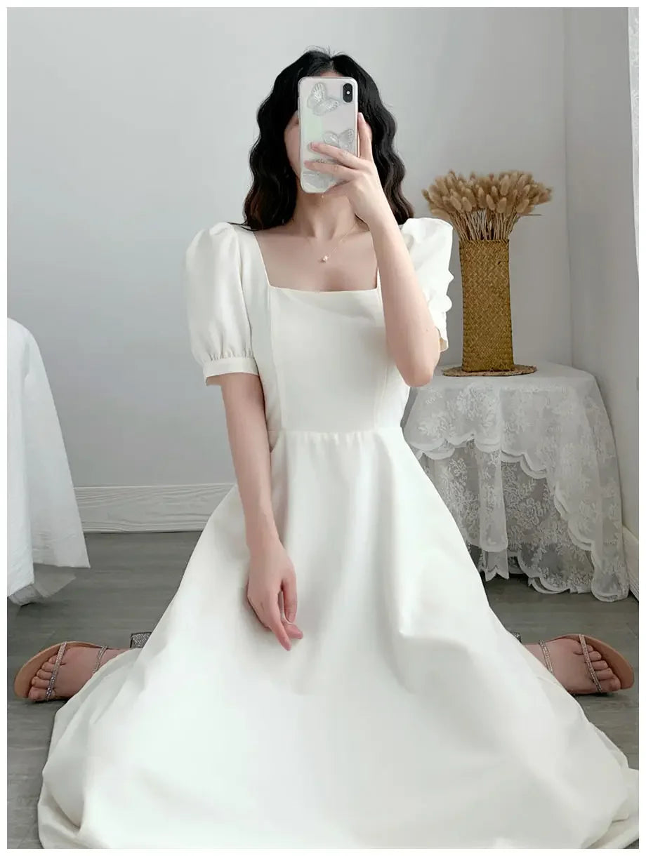 Elegante bruiloft gast jurk in pastelkleuren